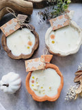 Small wooden pumpkin candle