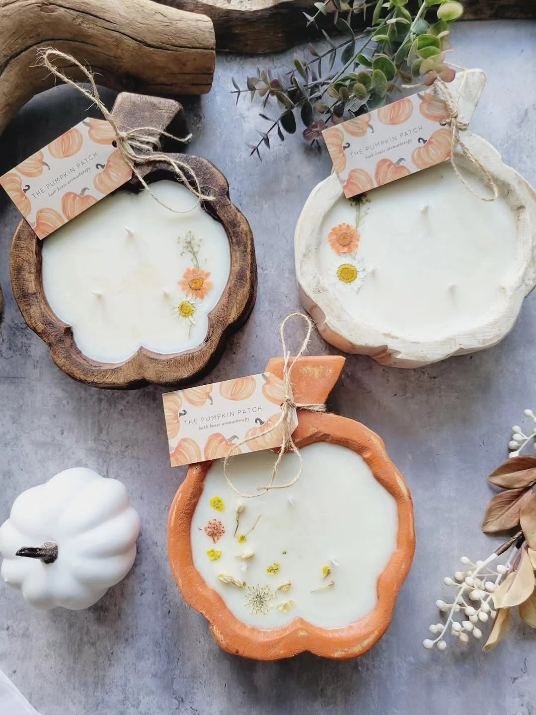 Small wooden pumpkin candle